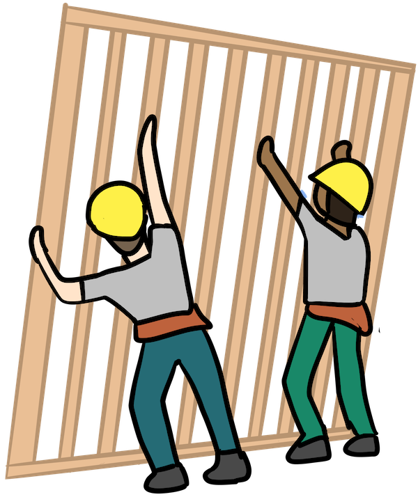 Construction workers framing a house