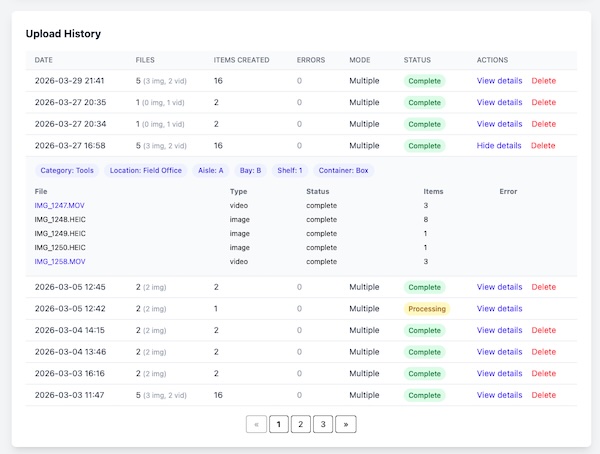Upload History showing past batches with dates, file counts, status, and options to view details or delete