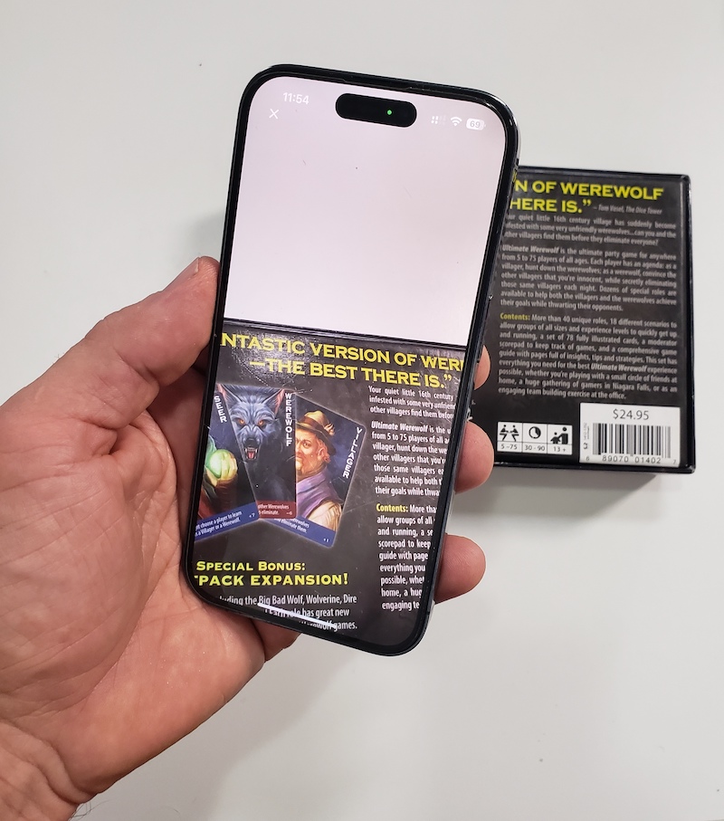 Image of mobile phone scanning the UPC on a card game (Werewolf - Deluxe Edition)